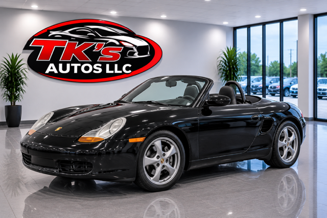 Black Porsche Boxster convertible on the lot