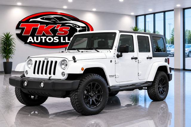White Jeep Wrangler Unlimited on the lot